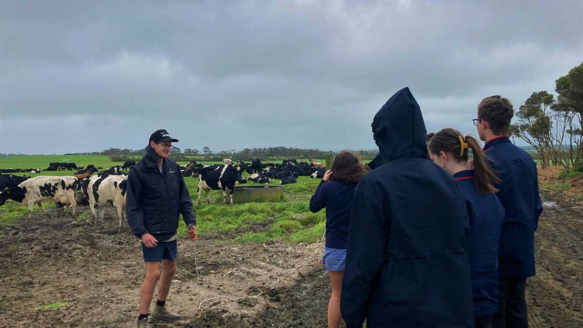 Bass Secondary College students learn about working on a dairy farm as part of the EXCITED 4 Careers in Agriculture program. Picture supplied by CQUniversity