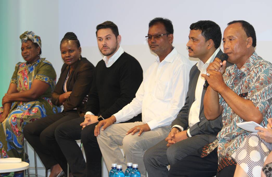 The smallholder panelists and their interpreters. The smallholders came from Kenya, Brazil, India and Indonesia. 