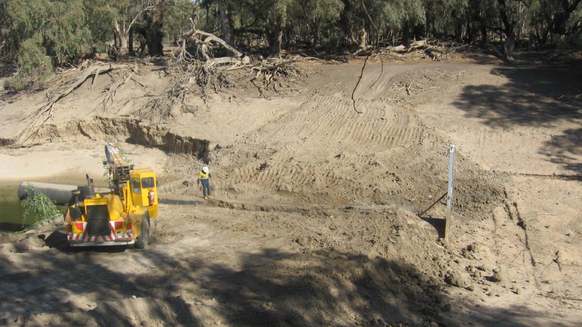 Work underway removing Lower Darling block banks. Photo: WaterNSW