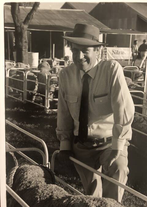 The late Angus McDonald snapped while looking over Egelabra Merino sale rams during his most active years.