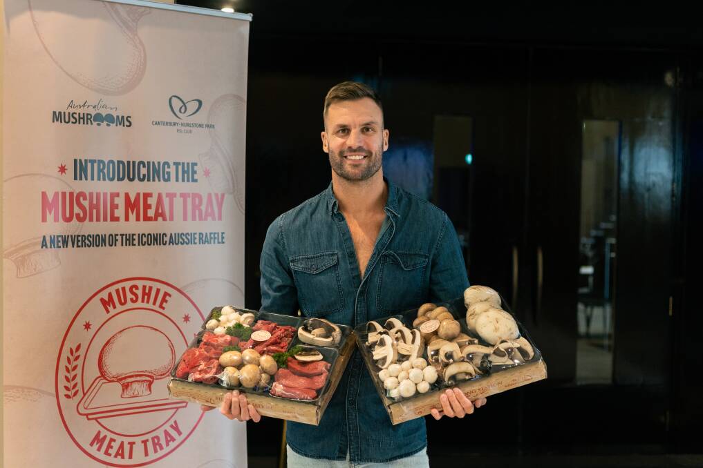 Former rugby league player turned television personality, Beau Ryan, with the world's first Mushie Meat Tray, and a Mushie Tray, ready to be raffled off at the Canterbury-Hurlstone Park RSL Club, Sydney. Picture supplied
