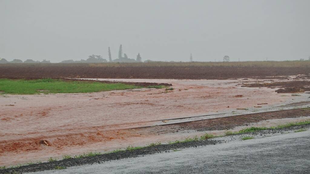 TOP OFF: Valuable top soil being swept away as torrential rain pounds the region. 