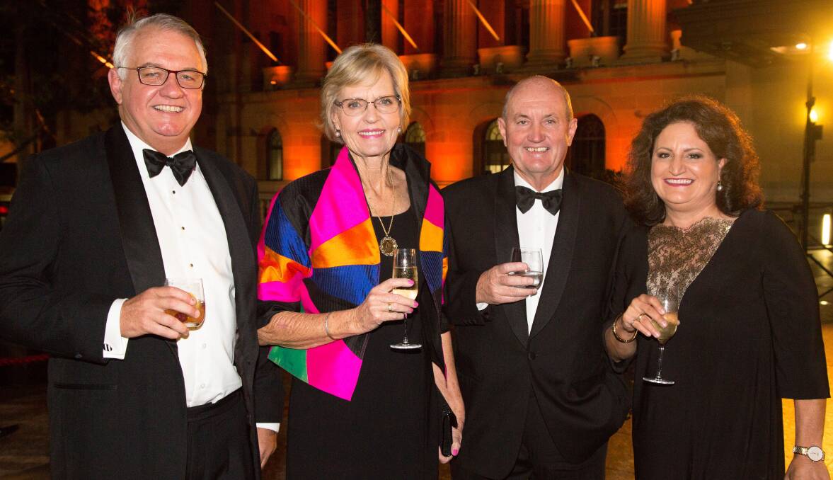 CELEBRATION: Paul Tully, Nell and David Brook and Trish Tully enjoy the McInnes Wilson 40th anniversary function at Brisbane City Hall on Saturday.