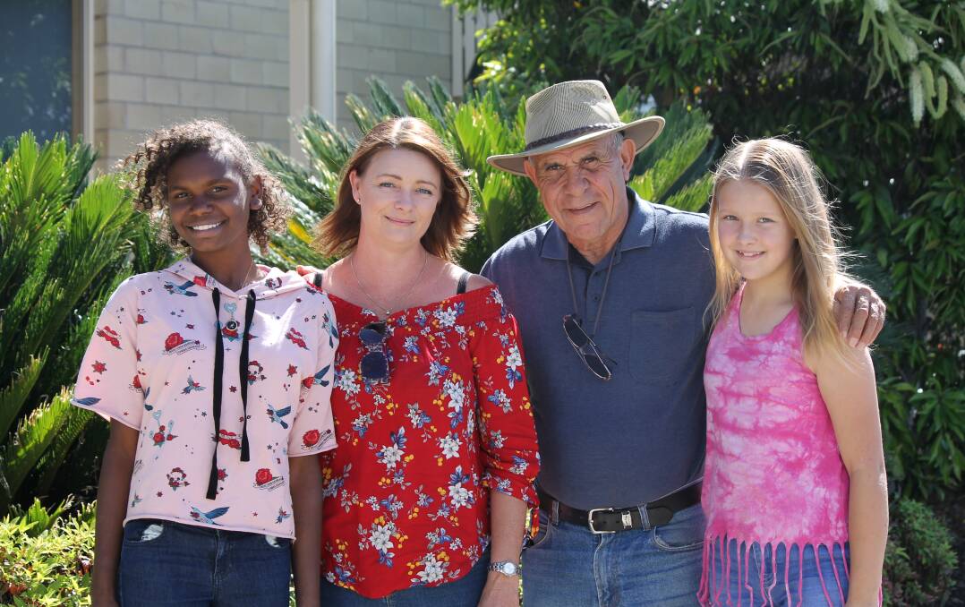 STORYTELLERS: Nickitta Sharp and Uncle John Long with Ms Sharp's daughters Tanisha, 13 and Tilly, 12. Photo: Larraine Sathicq
