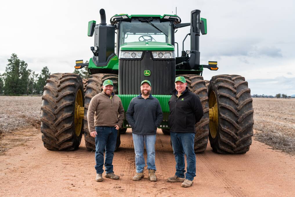 LOVE AT FIRST SIGHT: Owners of AgTrac Services, brothers David, Sam and Chris Haworth, were instantly impressed with the bolstered engine capacity of the new John Deere 2022 9 Series 9R 520 tractor during a recent demo.