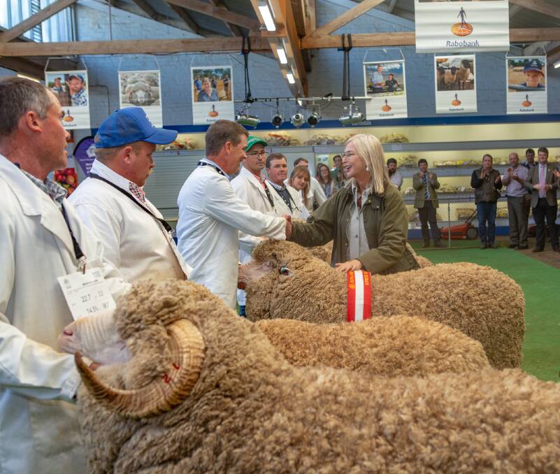 DESSED TO THRILL: Australian Wool Innovation chairman, Colette Garnsey, congratulates Nick Wadlow, Old Ashrose, Hallett, on a win during this year's Adelaide Show. She said sheep handlers at the Adelaide Show always looked "smart". 