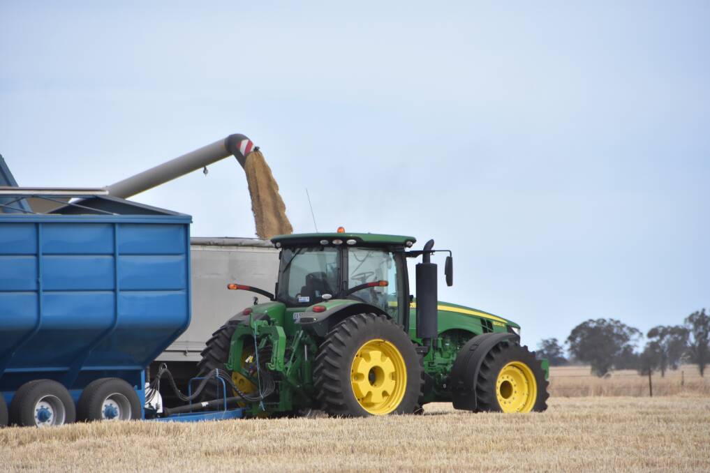 FISTFUL OF DOLLARS: Last season's bumper grain harvest has helped boost demand for new tractors. Picture by GREGOR HEARD. 