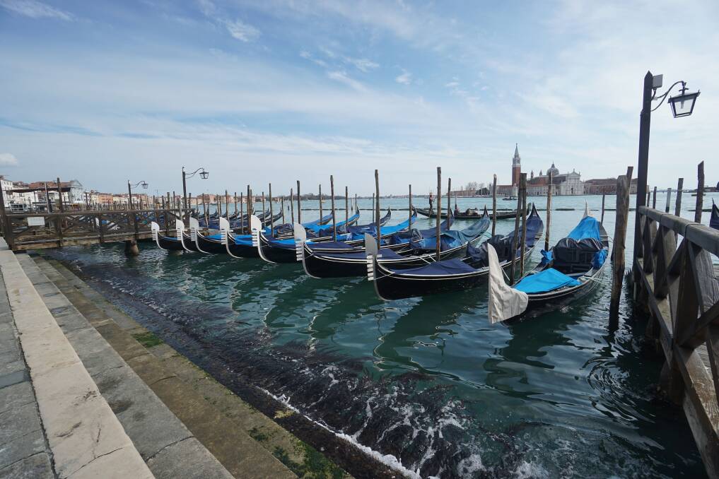 IDLE GONDOLAS: Rows of gondolas lie vacant in the Italian city of Venice. 
