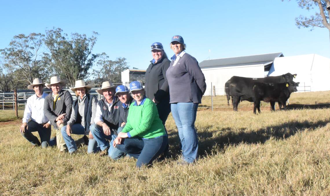 The $65,000 Texas Undine M508 and her heifer calf purchased by Boambee Angus, East Seaham with stud principal Margo Duncan and her daughters Kerrie Taylor and Pennie Lieb, manager Jamie Gresser, Tex principals Ben and Wendy Mayne with auctioneer Michael Glasser, Ray White GTSM and Texas overseer Hayden Chappel.
