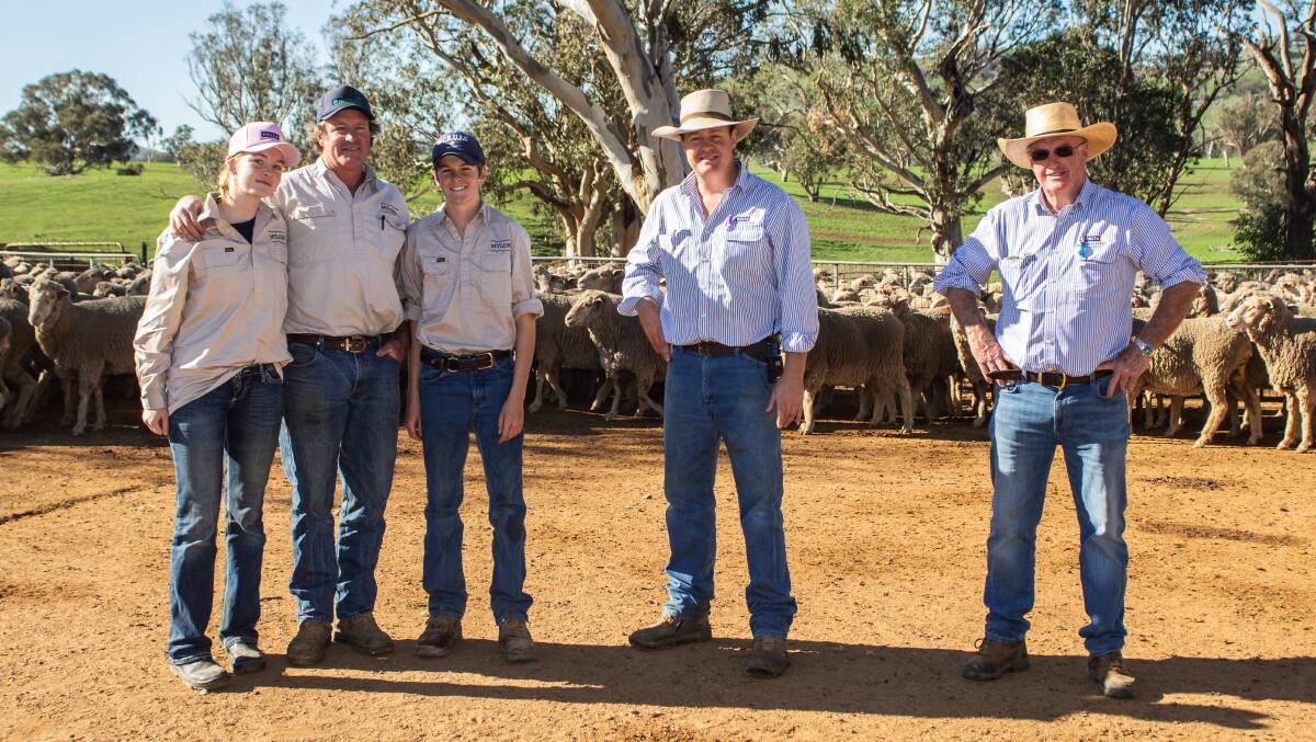 Sophie, Angus and Ollie Graham, Mylora, Binalong with Delta Livestock agents Cam Rosser and David Corcoran. Photo by Dean Kinlyside. 