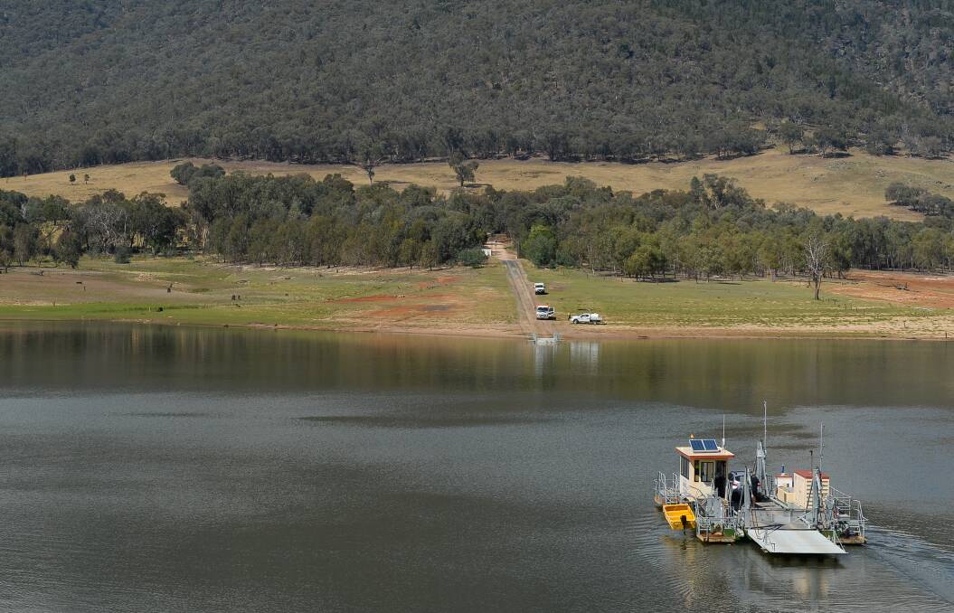 FLASHBACK: The Wymah ferry in operation across the Murray River. It has been grounded as part of the blockade of the NSW-Victorian border. Picture: MARK JESSER