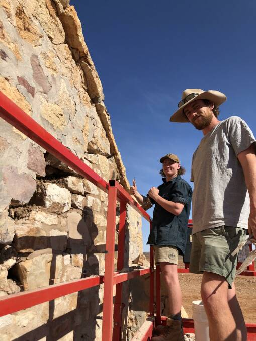 Apprentice Adam Evans and stonemason Cameron Rae working on the Cordillo Downs woolshed. 