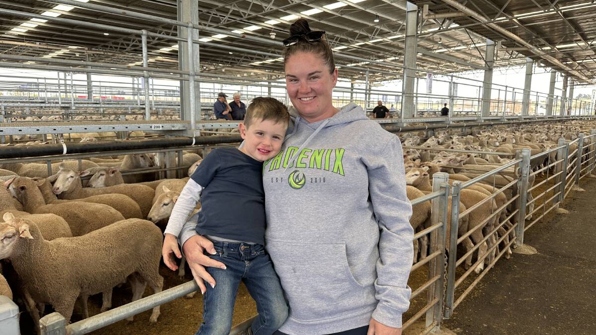 Mitchell Dans, 3, and Tara Ford, Brentwood Farming, Daylesford, sold 147 April/May 2023-drop lambs for $90 at Ballarat. Picture by Philippe Perez 