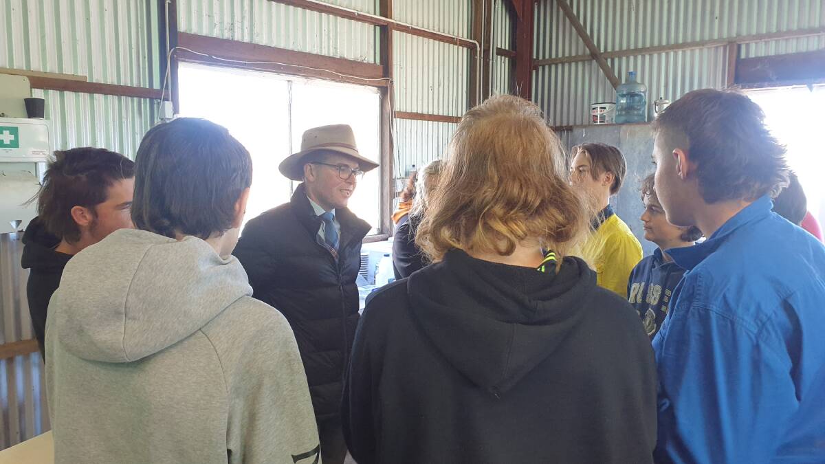 NSW Agriculture minister Adam Marshall talks to participants at the Wool Works shearing school at Glen Innes. 