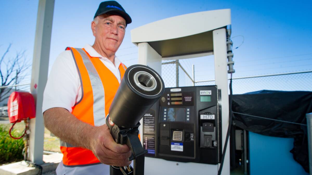Mark Smeaton, the former project director for ActewAGL's hydrogen refuelling project, with the hydrogen pump at Fyshwick. Picture by Elesa Kurtz