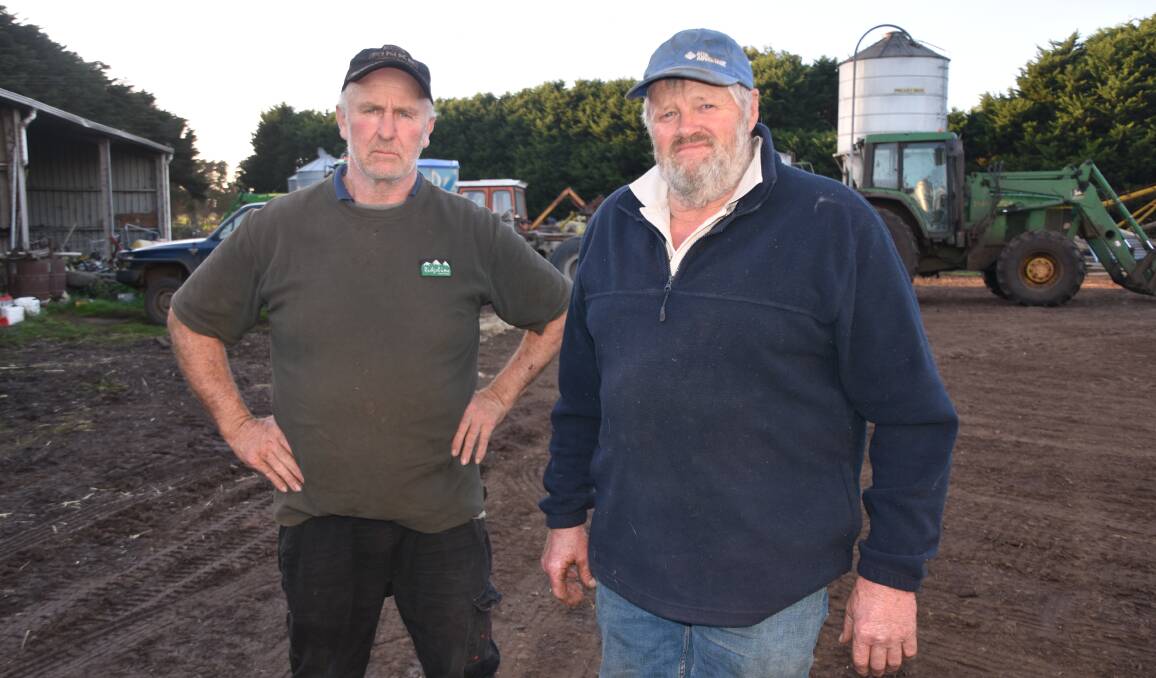 PREPARED TO FIGHT: Bookaar dairy farmers Andrew Duynhoven and Robert Towner are leading the charge to stop a solar farm being built in their area.