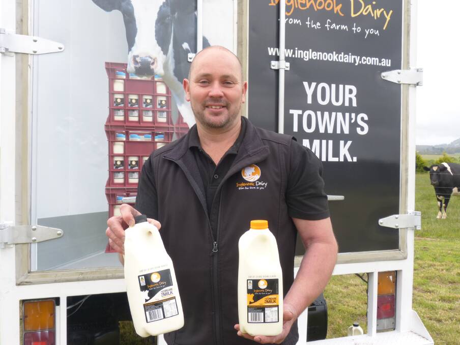 PROMOTION: Mr Peterken in front of a recently sign-written truck promoting the milk brand.