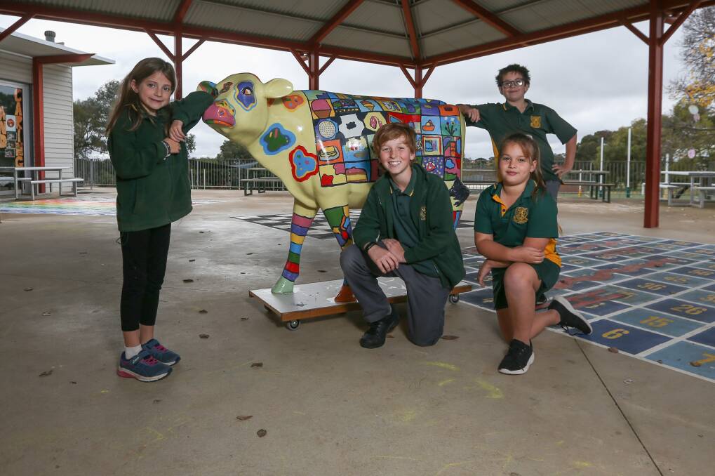 MOO-VING: St Mary's Primary School at Rutherglen, Vic, has taken part in the Picasso cows program, with Connie Morris, year 2, Elijah McFarland, year 5, Isla Verhulst, year 2 and Carvyn Stubbs, year 5 contributing. Picture: TARA TREWHELLA