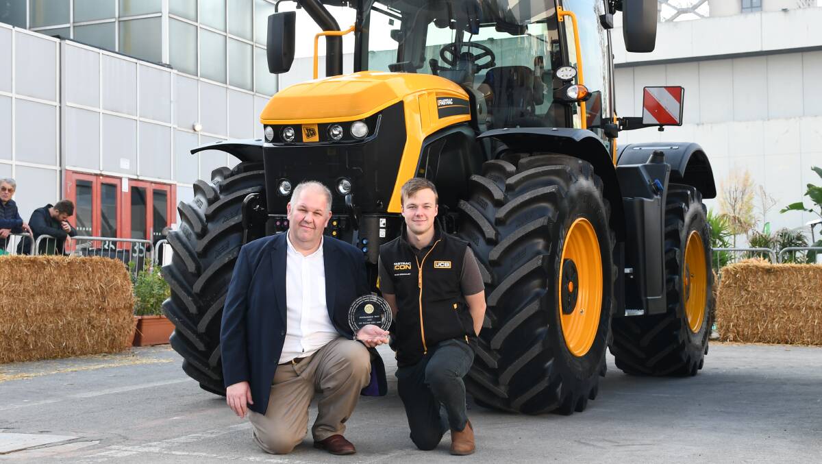 JCB Fastrac product and sales general manager Greg Fitton and agricultural sales engineer Sean Whiteway with the Fastrac 4220 Icon. 