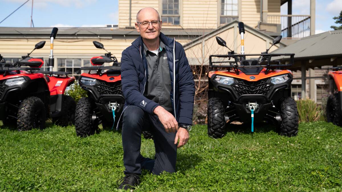 Mojo Motorcycles technical support and training manager Lance Whitelock with CFMoto's new CForce 520 EPS and 400 EPS quad bikes. 