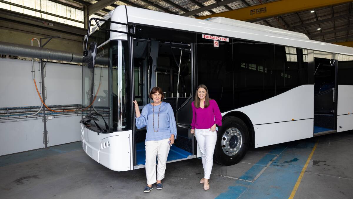 Environment Minister Meaghan Scanlon and Mackay MP Julieanne Gilbert take a look at BusTech's bioethanol-powered buses.