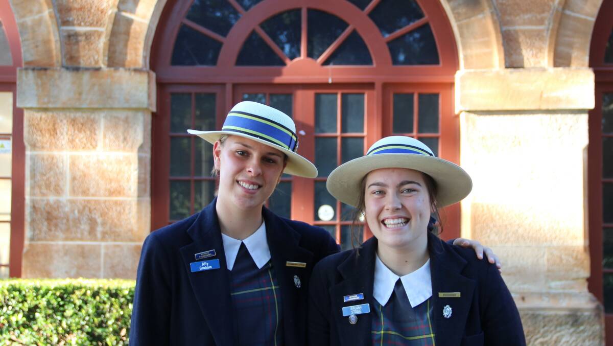 Fairholme College year 12 students Ally Graham and Arliah Stagg hope to work in the agricultural industry when they leave school. 