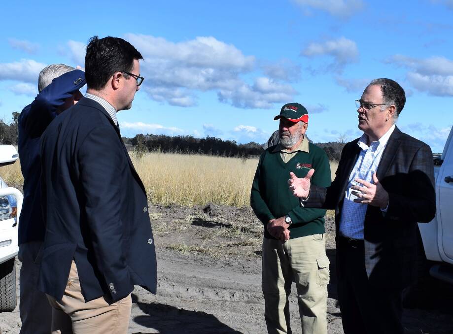 Granite Belt Water CEO Lloyd Taylor (right) talking to Agriculture Minister David Littleproud, Deputy Prime Minister Michael McCormack and Wally Sweet, Sweets Strawberry Runners, about the project. 