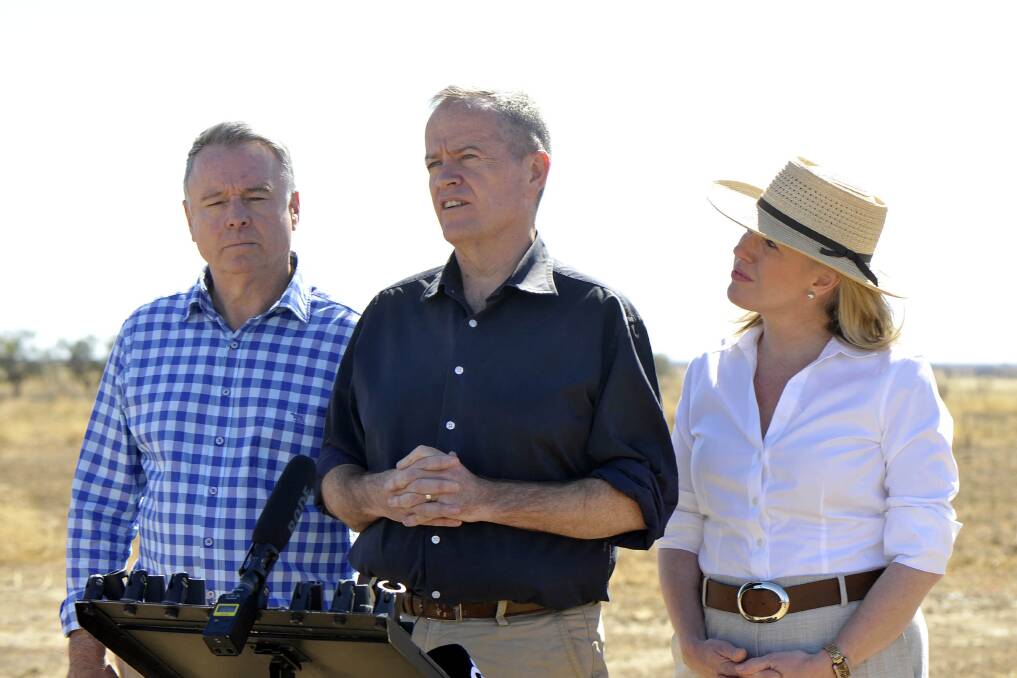 Labor agriculture spokesman Joel Fitzgibbon with Opposition Leader Bill Shorten and wife Chloe at Latrobe Station in Longreach, Queensland, Tlast year. Photo Sam Rutherford.