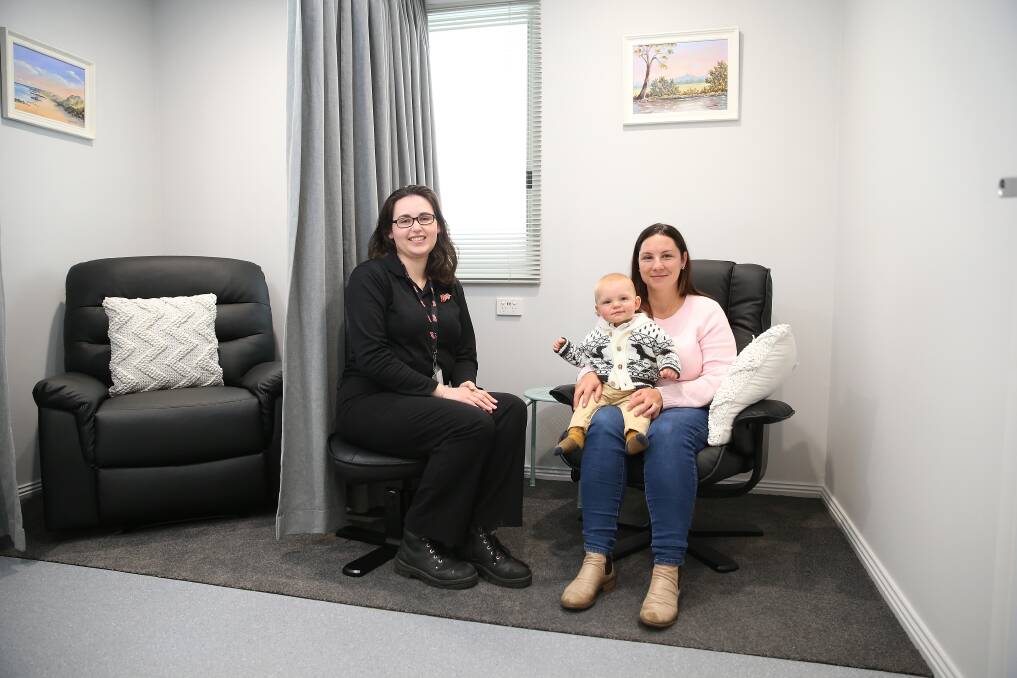 Embracing change: Bega quality operations officers Nichaela King and Emma McElgunn, with her son Fred, 9 months, at the new breastfeeding room at the factory in Koroit. Picture: Mark Witte