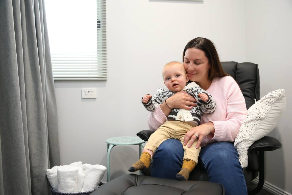 Breaking barriers: Bega worker Emma McElgunn with son Fred, 9 months, at the new breastfeeding room at the Koroit factory. Picture: Mark Witte