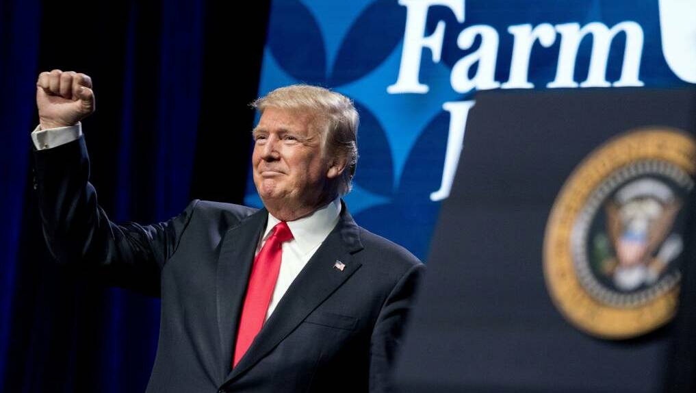 President Donald Trump pumps his fist after speaking at the American Farm Bureau Federation's Annual Convention at the Gaylord Opryland Resort and Convention Center in January. Photo by AP / Andrew Harnik.