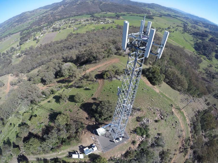 Victorian Minister Philip Dalidakis is hitting out at the federal blackspot program as his state partners with Optus for new towers in regional areas.