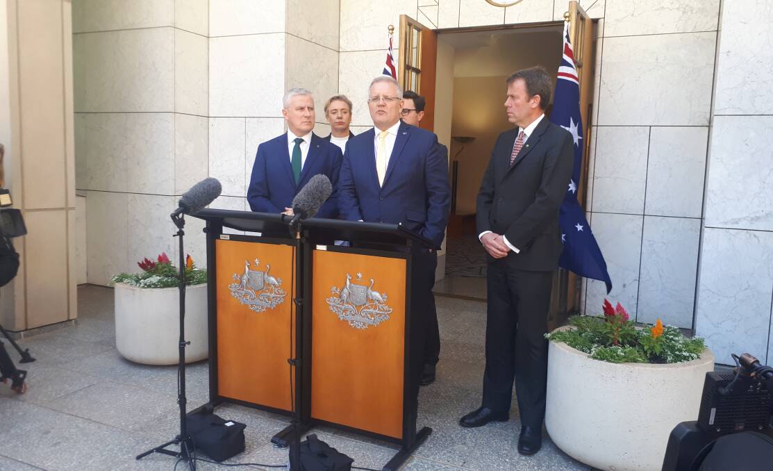 Prime Minister Scott Morrison announcing more drought funding, flanked by Deputy PM Michael McCormack, Agriculture Minister Bridget McKenzie, Drought Minister David Littleproud, and Education Minister Dan Tehan.