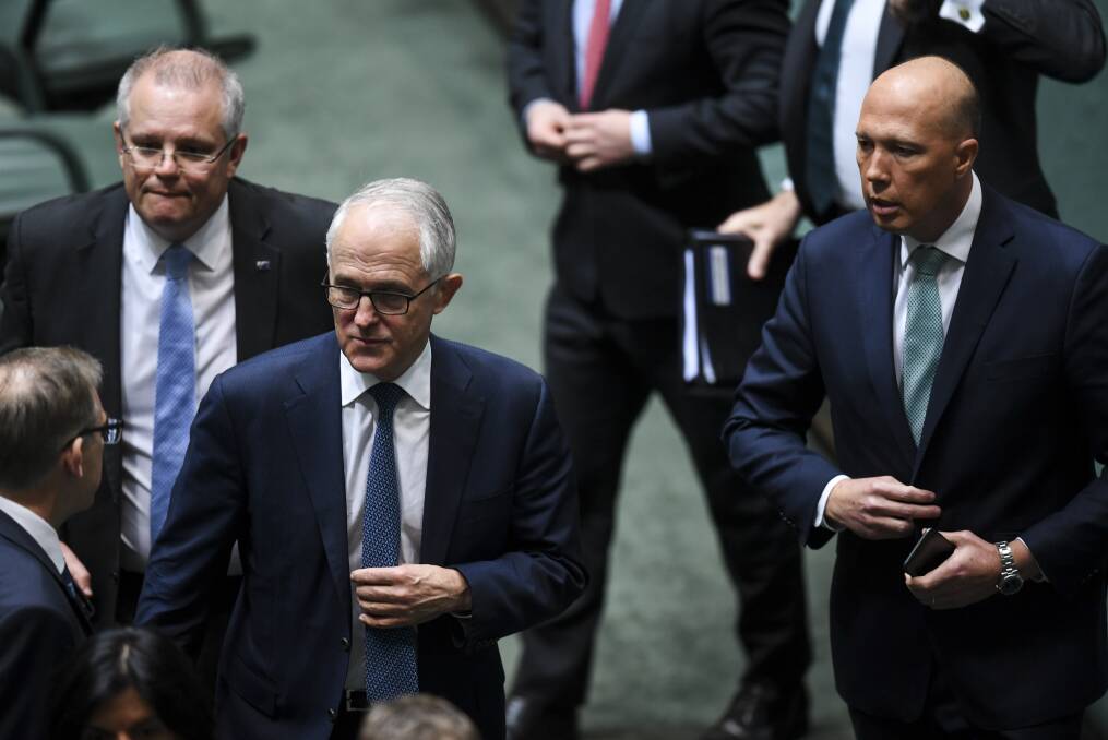Liberal spill: Malcolm Turnbull and Peter Dutton in Parliament today. Photo Lukas Coch