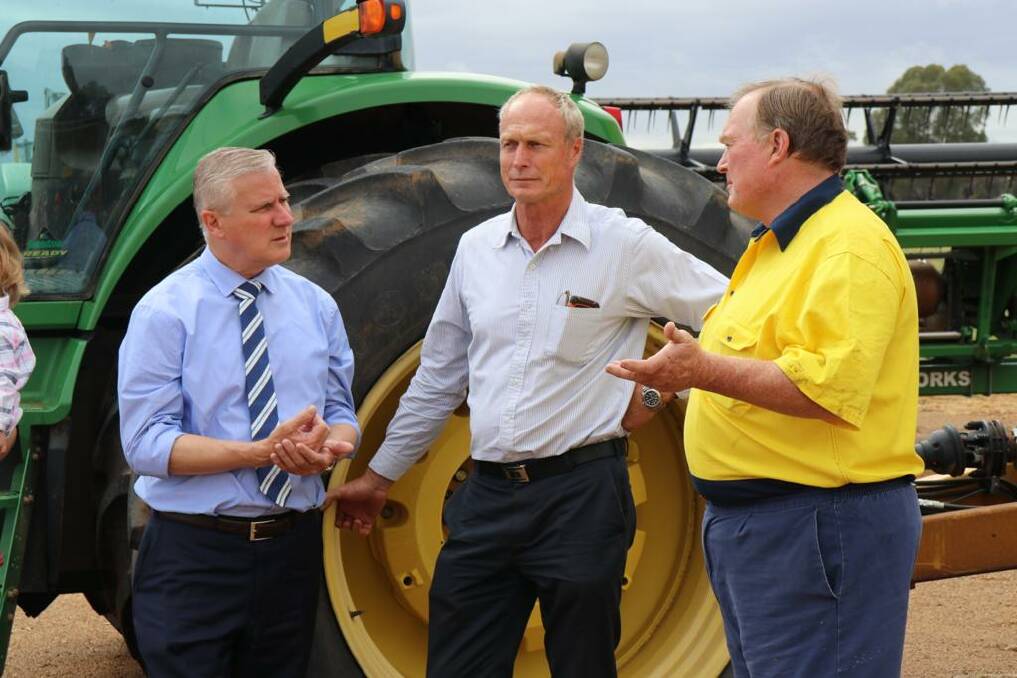 Acting Prime Minister and Infrastructure and Transport Minister Michael McCormack launches the Common Roads, Common Sense campaign near Wagga Wagga, NSW with former NSW Drought Transport adviser and Corowa farmer Derek Schoen and Yerong Creek farmer Peter Yates.