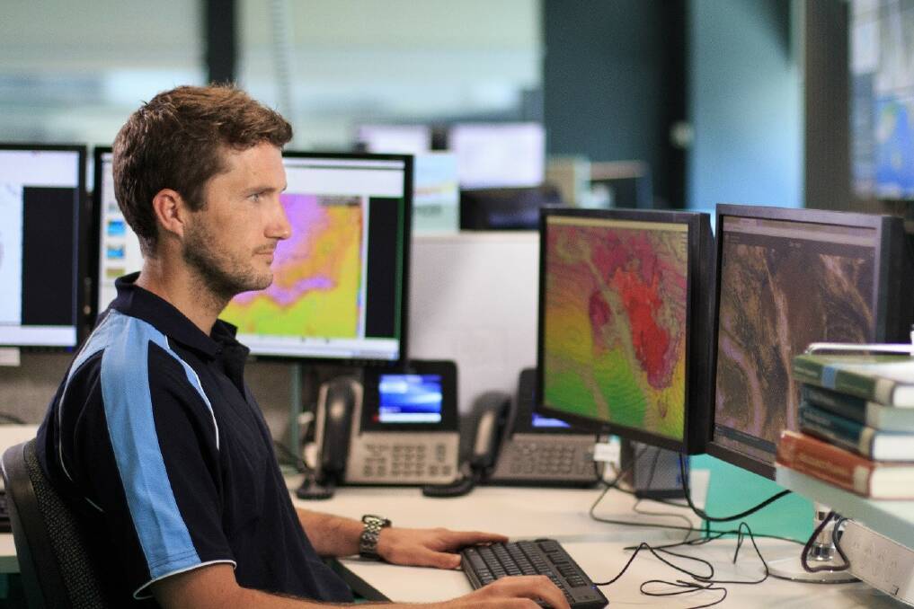 Meteorologists overlay their knowledge and experience onto weather model information and observations to produce the forecast. Photo: Bureau of Meteorology