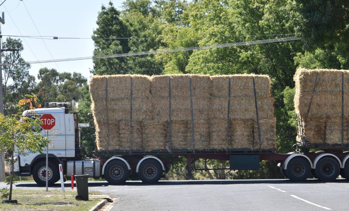 MOVING: While hay is still being moved, many loads are just meeting existing orders as rain impacts demand.