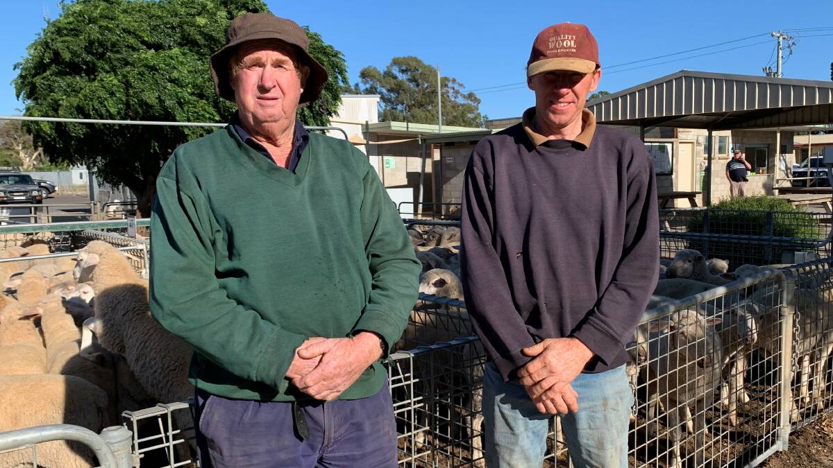 ATTENDEES: Ron and Randal Schutz, Karoonda, SA, were at Ouyen's fortnightly sheep sale last week.