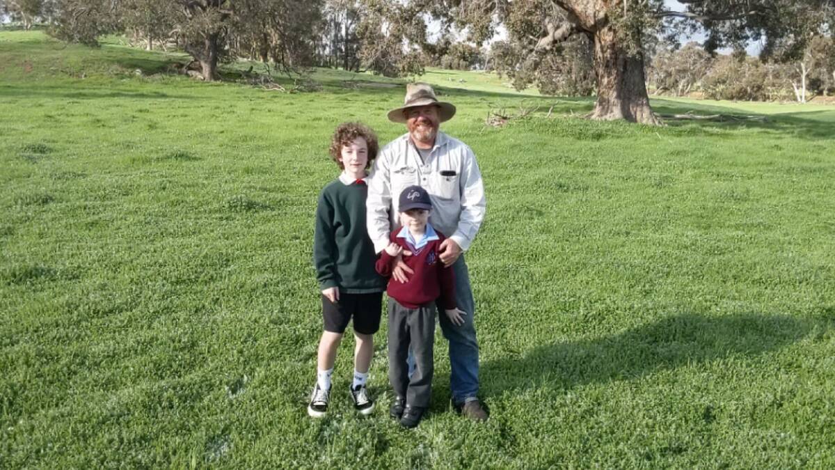 Wayne Girando with sons Jack and Finn on their Boyup Brook, WA, property.
