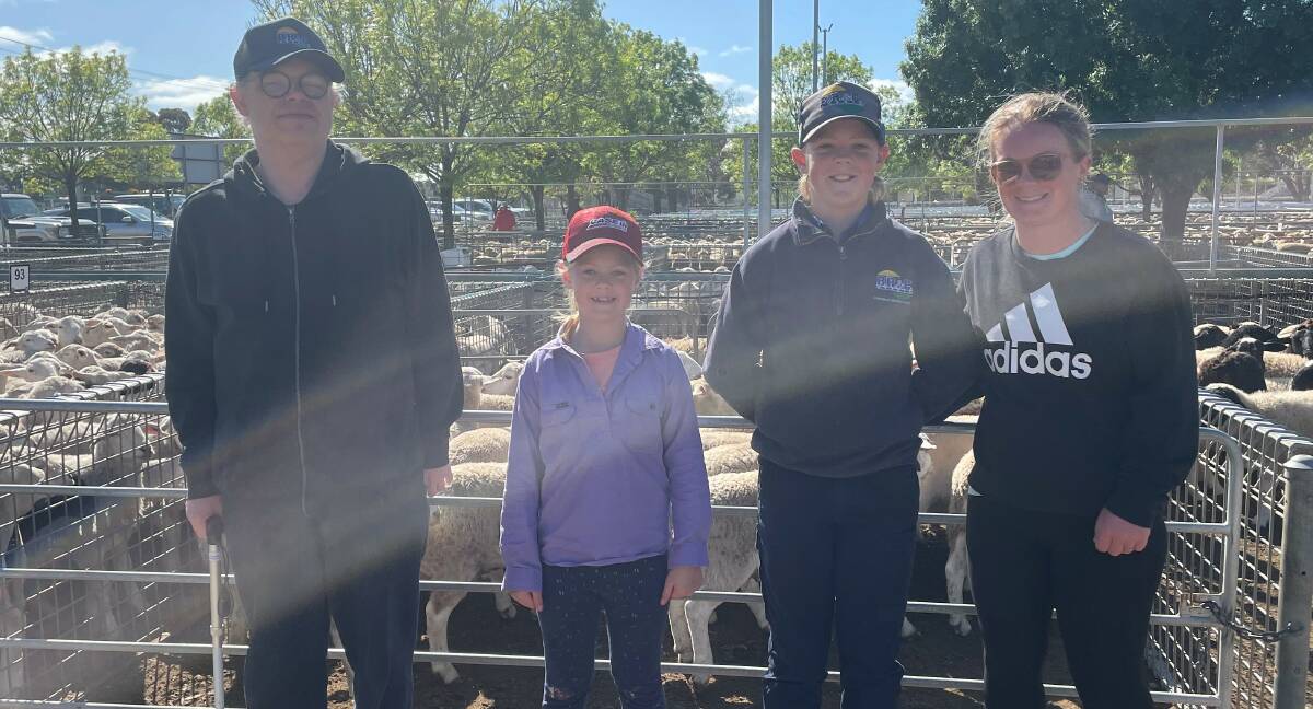 Clem Blake, with Isabella, Nate and Jenna Singleton, Ouyen, at their local market last week. Picture supplied.