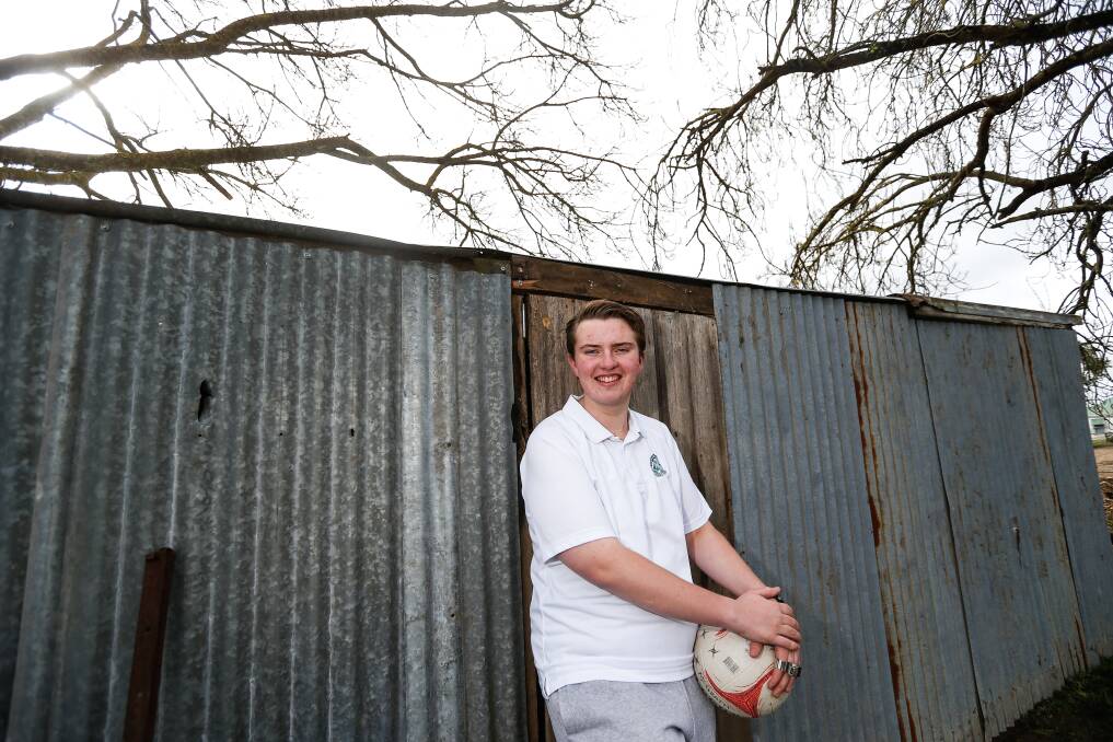 JUGGLING ACT: Teenager Leo McGrath works on his family's dairy farm at Orford and umpires Hampden netball league open matches. He is passionate about the sport. Picture: Anthony Brady 