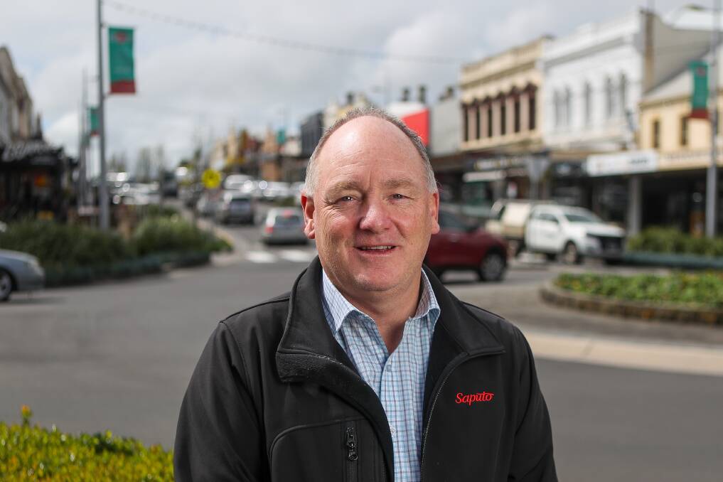 VOUCHER: Saputo Dairy Australia's Gerard Lourey is delighted to offer employees vouchers to inject money back into the local economy. Picture: Morgan Hancock