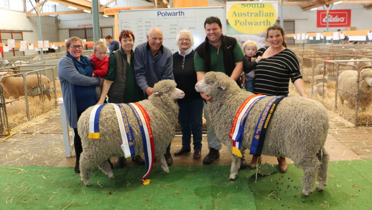 FAMILY AFFAIR: The Taljar team including Cherrie Brown with Ben, Lynne and David McArdle, and Jared and Talisa McArdle, holding her son Toby Kerr with judge Jan Hunt, Mt Gambier, SA (centre), at last year's Royal Adelaide Show.