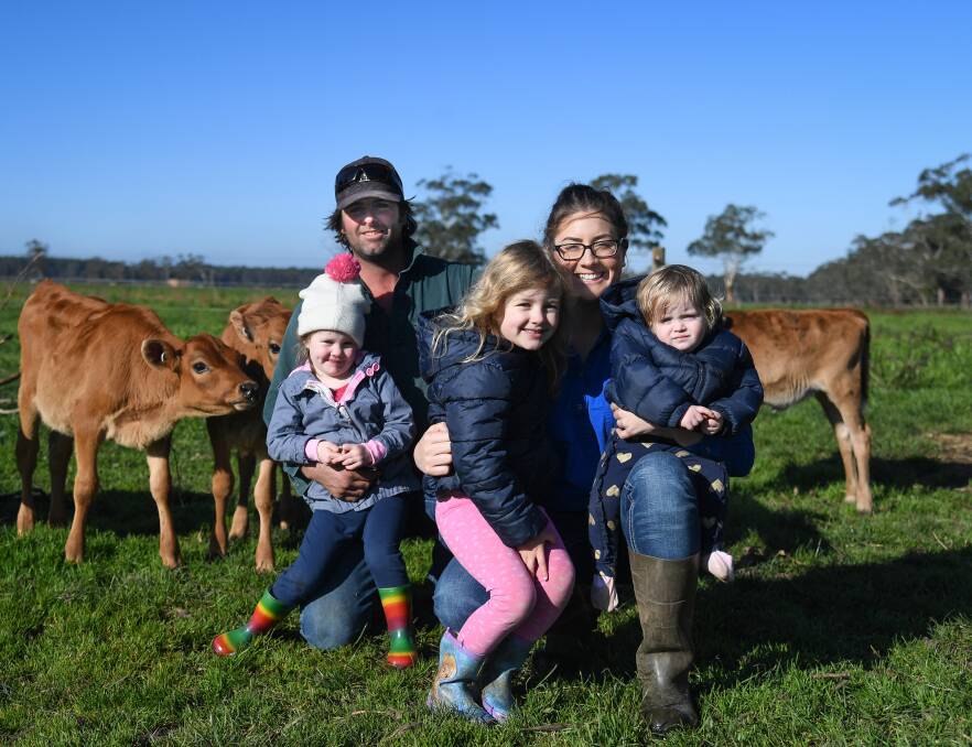 HOPEFUL: Carlie Barry, pictured with husband Owen and family, seeks last-minute nomination for the Dairy Australia board.