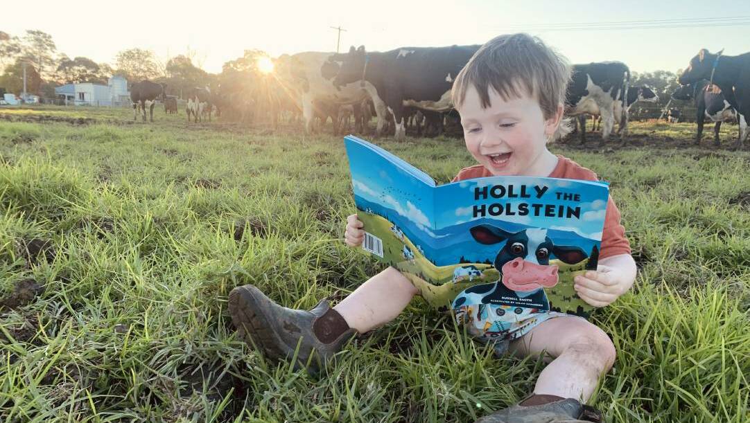 Albert Nicholson takes his copy of Holly the Holstein everywhere he goes on Jones Island farm. Photo supplied