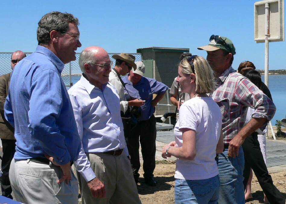 Prime Minister John Howard and local MP Alexander Downer with Sally and Colin Grundy during the Millennium Drought.