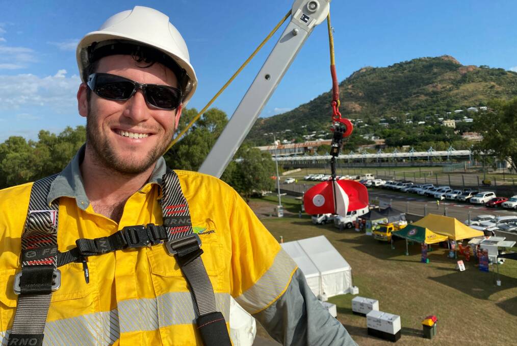 Simple but life saving: Acting Ergon Area Manager Ryan Campbell demonstrates the effectiveness of rotamarkers at the NQ Field Days in Townsville. Picture: Supplied