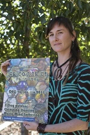 Some doubt: Co-organiser Hayley Wilson holds a poster promoting last year's Reconnect Festival, held near Bowhill, which has caused neighbours to petition council.