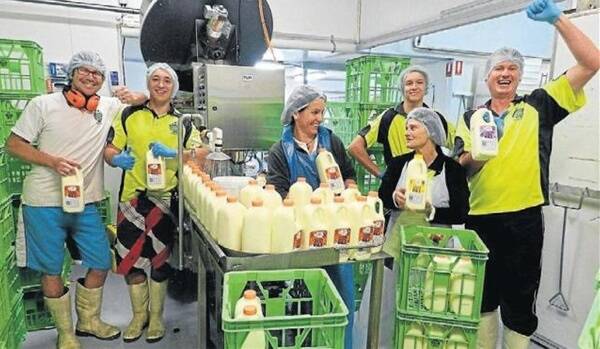 The Mungalli Creek Dairy team celebrate nine new awards to add to their collection.