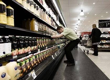 "Coles and Woolworths plan to expand store floor space by more than 5 per cent a year." Photo: Louie Douvis